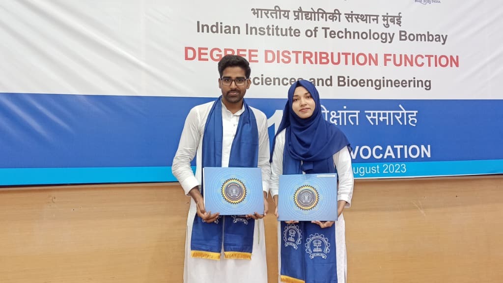 Shabab Anwar and Sabiha Parveen holding their IIT Bombay degrees at Convocation